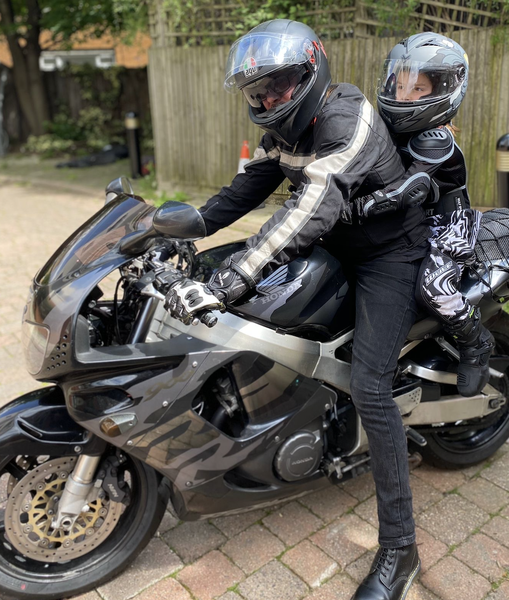 A Honda Fireblade with a young pillion